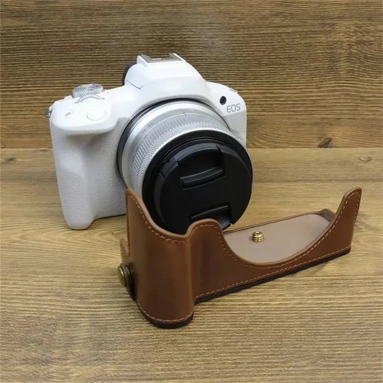 For Canon EOS R50 / R100 PU Leather Bottom Case Half Body Camera Cover with Wrist Strap