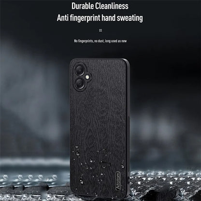 For Samsung Galaxy A05 4G Wood Texture PU Leather Coated PC+TPU Mobile Phone Back Case