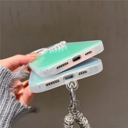 For iPhone 14 Pro Case with Wrist Strap Laser Effect PC+TPU Pearls Heart Decor Phone Protector