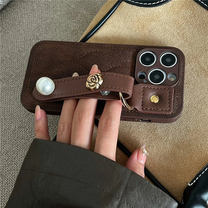 For iPhone 15 Pro Max Wristband Phone Case Down Jacket Design PU Leather + TPU Back Cover