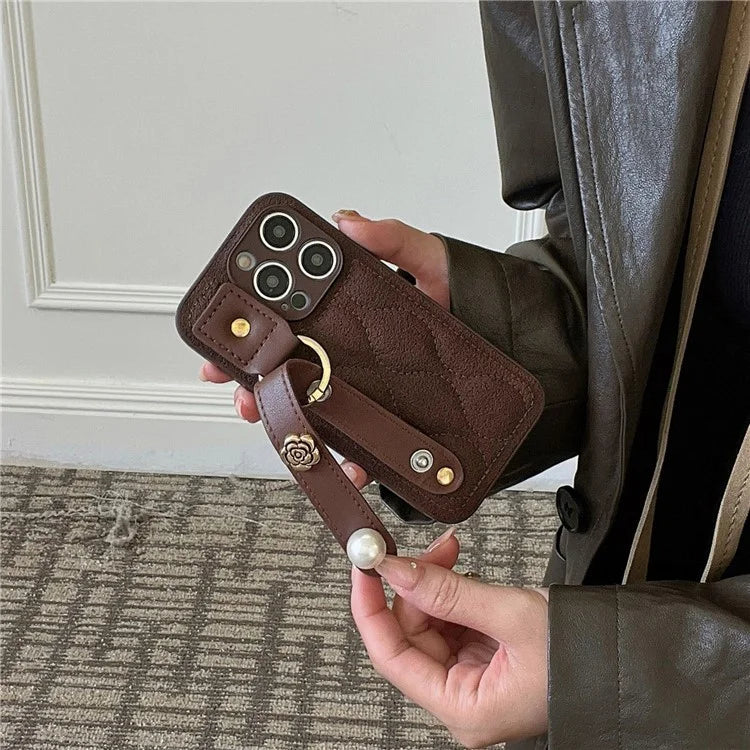 For iPhone 15 Pro Max Wristband Phone Case Down Jacket Design PU Leather + TPU Back Cover