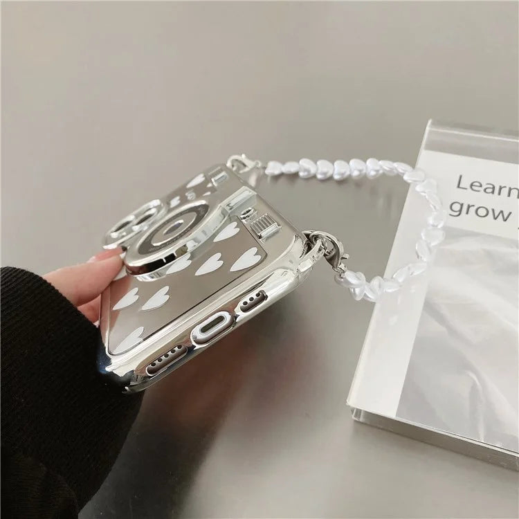 Camera Shaped TPU Cover for iPhone 14 Plus Mirror Surface Electroplating Phone Cases with Bead Strap