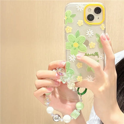 For iPhone 15 TPU Case Green Flower Pattern Glitter Phone Cover with Chain Strap