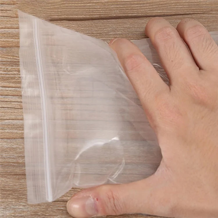 MX-054 100Pcs / Pack Grip Seal Bags 10 x 15cm Reusable PE Packaging for Beads Jewelry Snacks