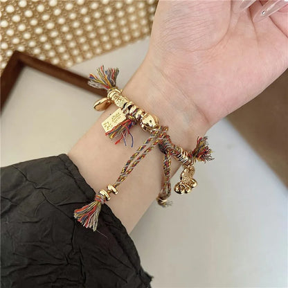 For Apple Watch Series 9 8 7 41mm / 6 5 4 SE (2023) SE (2022) SE 40mm / 3 2 1 38mm Woven Rope Watch Band with Peace Lock Pendant