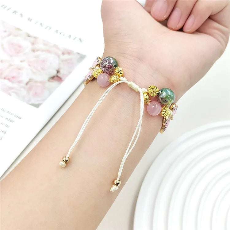 For Apple Watch Series 10 42mm / 9 8 7 41mm / SE (2023) SE (2022) SE 6 5 4 40mm / 3 2 1 38mm Butterfly Beads Watch Strap Drawstring Wrist Band