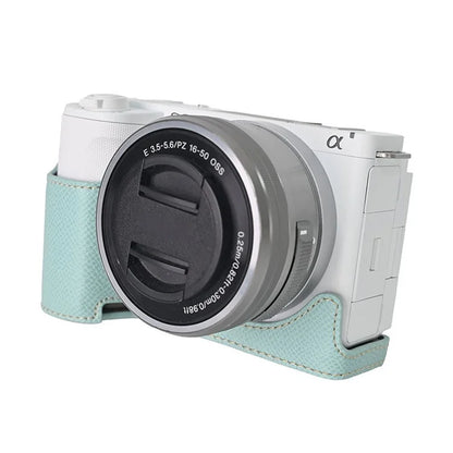 For Sony ZV-E10 II Textured PU Leather Camera Case with Battery Hole + Strap + Lens Storage Bag