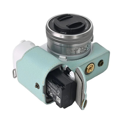 For Sony ZV-E10 II Textured PU Leather Camera Case with Battery Hole + Strap + Lens Storage Bag