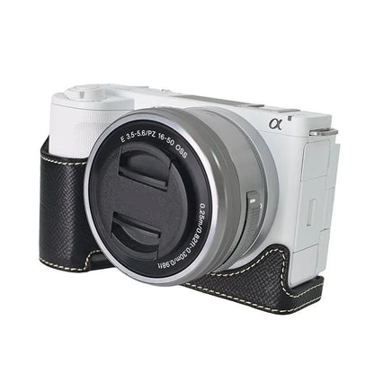 For Sony ZV-E10 II Textured PU Leather Camera Case with Battery Hole + Strap + Lens Storage Bag