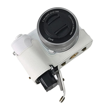 For Sony ZV-E10 II Textured PU Leather Camera Case with Battery Hole + Strap + Lens Storage Bag
