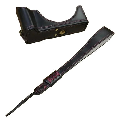 For Canon EOS R50 / R100 PU Leather Bottom Case Half Body Camera Cover with Wrist Strap