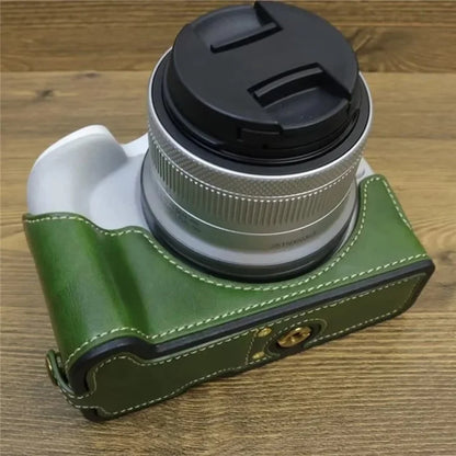 For Canon EOS R50 / R100 PU Leather Bottom Case Half Body Camera Cover with Wrist Strap