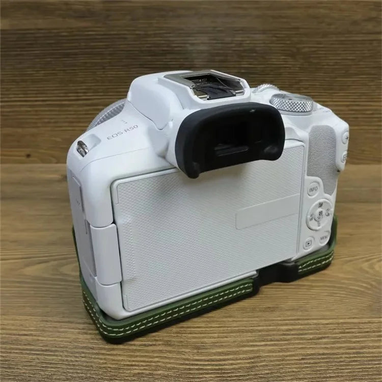 For Canon EOS R50 / R100 PU Leather Bottom Case Half Body Camera Cover with Wrist Strap