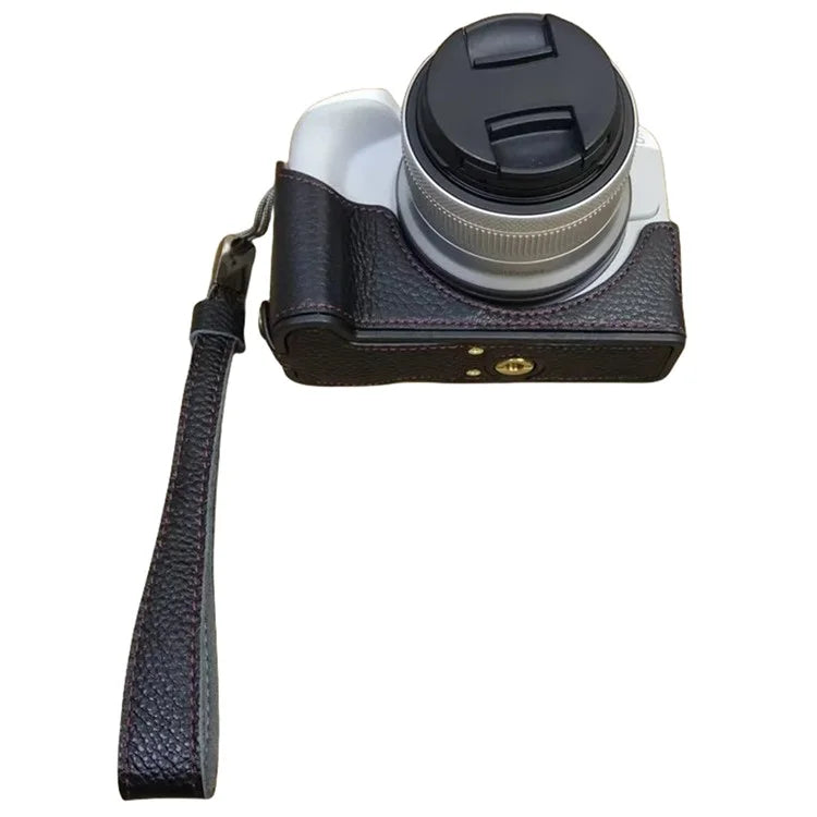 For Canon EOS R50 / R100 Genuine Cow Leather Camera Bottom Case Anti-drop Cover with Wrist Strap