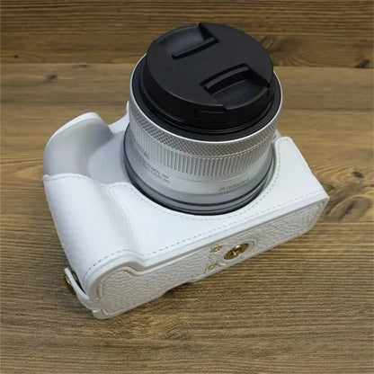 For Canon EOS R50 / R100 Genuine Cow Leather Camera Bottom Case Anti-drop Cover with Wrist Strap