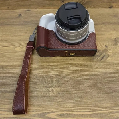 For Canon EOS R50 / R100 Genuine Cow Leather Camera Bottom Case Anti-drop Cover with Wrist Strap