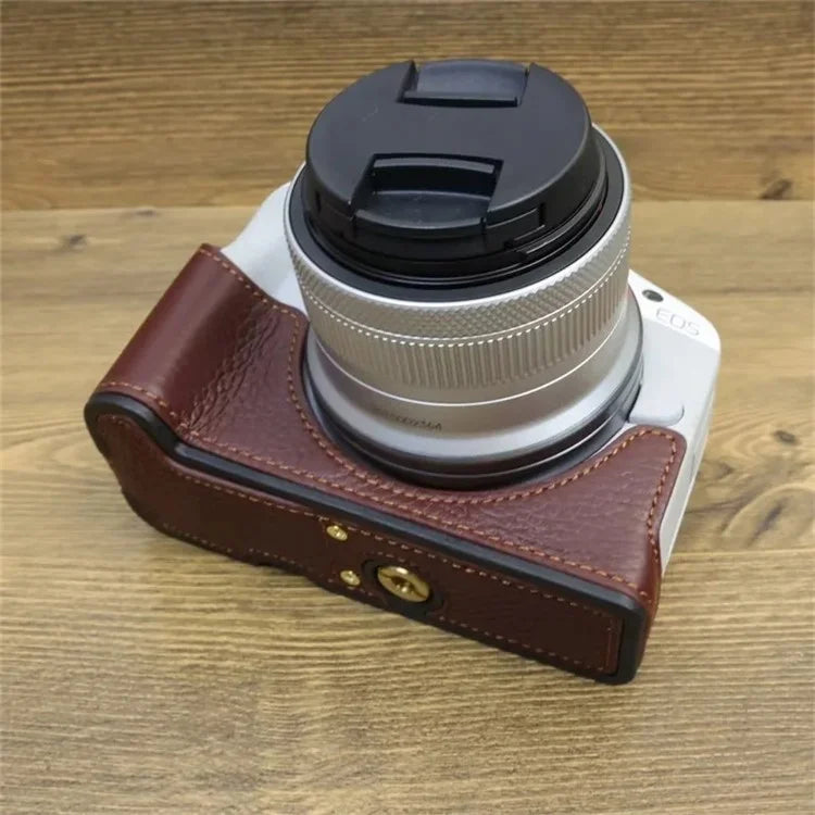For Canon EOS R50 / R100 Genuine Cow Leather Camera Bottom Case Anti-drop Cover with Wrist Strap
