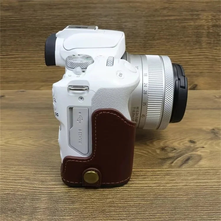 For Canon EOS R50 / R100 Genuine Cow Leather Camera Bottom Case Anti-drop Cover with Wrist Strap