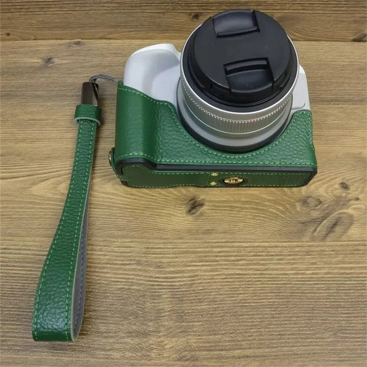 For Canon EOS R50 / R100 Genuine Cow Leather Camera Bottom Case Anti-drop Cover with Wrist Strap