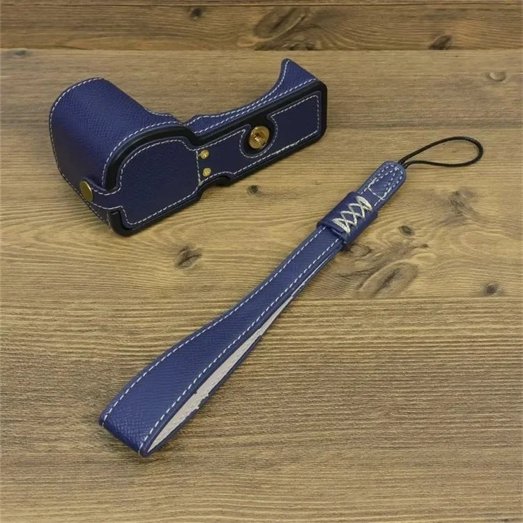 For Sony ZV-E10 PU Leather Bottom Case Battery Opening Design Camera Half Body Cover with Hand Strap