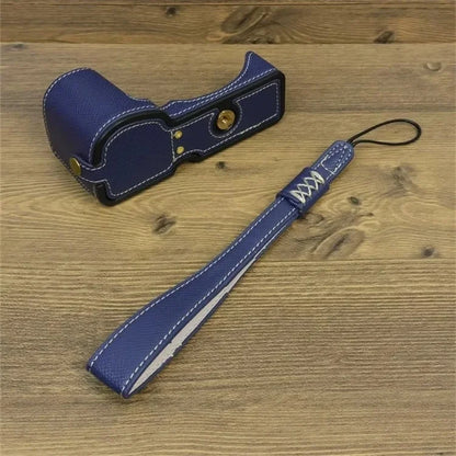 For Sony ZV-E10 PU Leather Bottom Case Battery Opening Design Camera Half Body Cover with Hand Strap