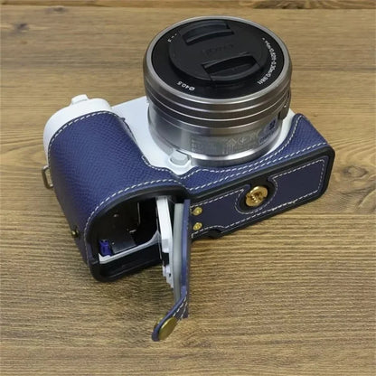 For Sony ZV-E10 PU Leather Bottom Case Battery Opening Design Camera Half Body Cover with Hand Strap