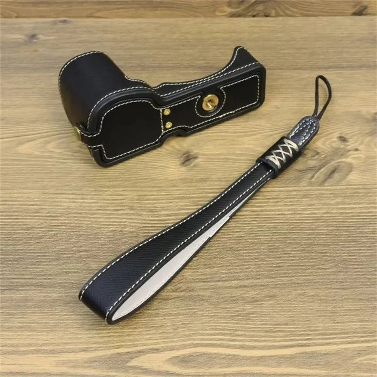 For Sony ZV-E10 PU Leather Bottom Case Battery Opening Design Camera Half Body Cover with Hand Strap