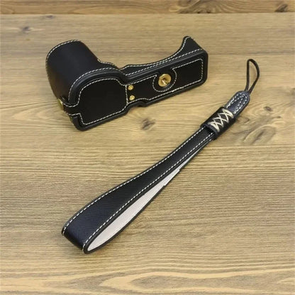 For Sony ZV-E10 PU Leather Bottom Case Battery Opening Design Camera Half Body Cover with Hand Strap