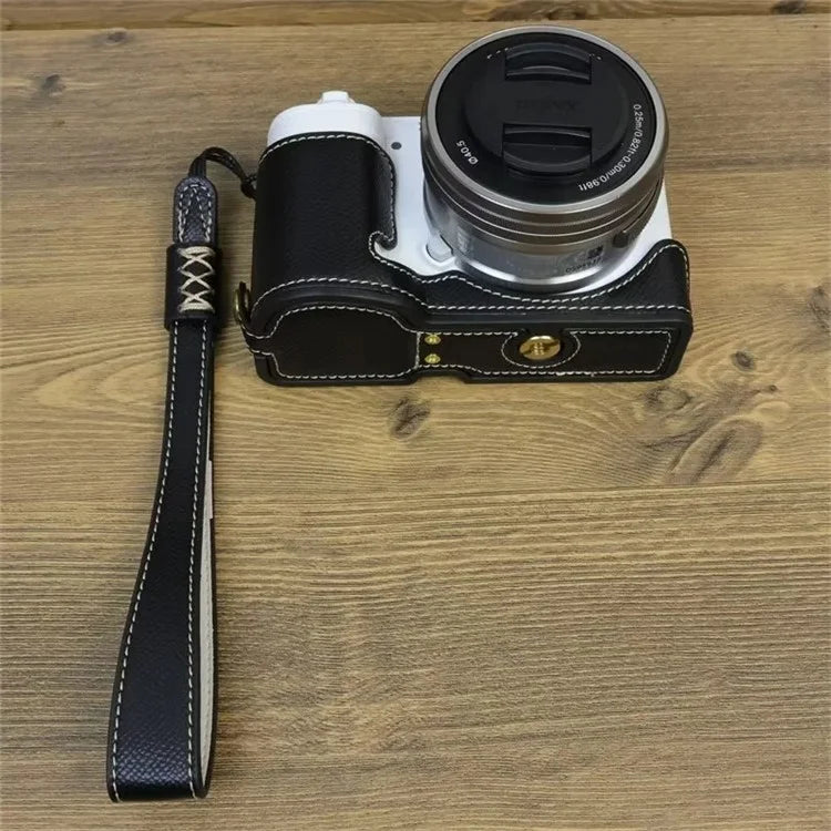 For Sony ZV-E10 PU Leather Bottom Case Battery Opening Design Camera Half Body Cover with Hand Strap