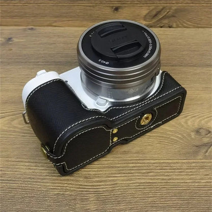 For Sony ZV-E10 PU Leather Bottom Case Battery Opening Design Camera Half Body Cover with Hand Strap