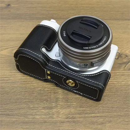 For Sony ZV-E10 PU Leather Bottom Case Battery Opening Design Camera Half Body Cover with Hand Strap