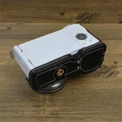 For Sony ZV-E10 PU Leather Bottom Case Battery Opening Design Camera Half Body Cover with Hand Strap
