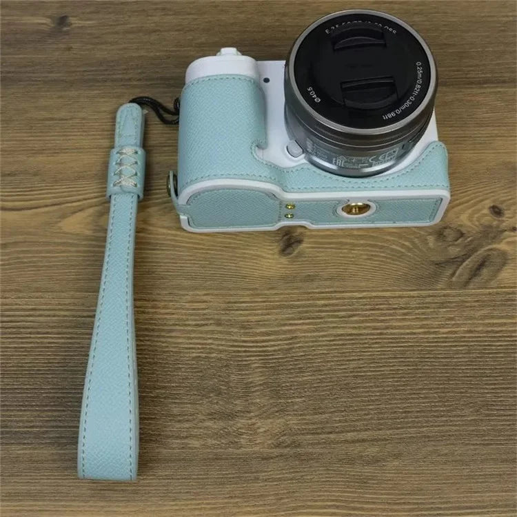For Sony ZV-E10 PU Leather Bottom Case Battery Opening Design Camera Half Body Cover with Hand Strap