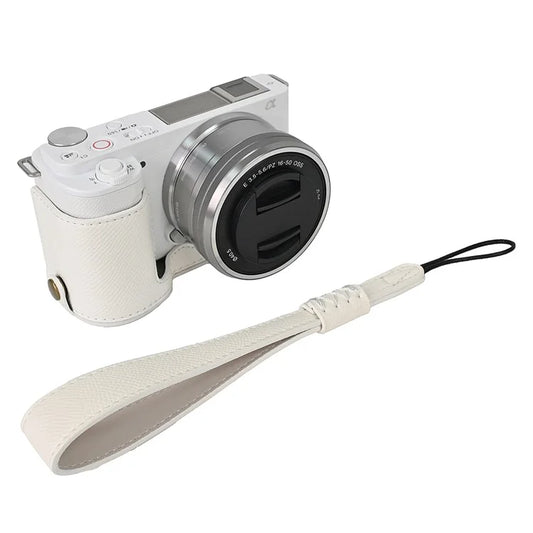 For Sony ZV-E10 PU Leather Bottom Case Battery Opening Design Camera Half Body Cover with Wrist Strap