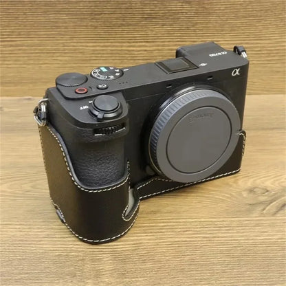 For Sony A6700 Dustproof PU Leather Camera Bottom Cover Half Body Case with Wrist Strap
