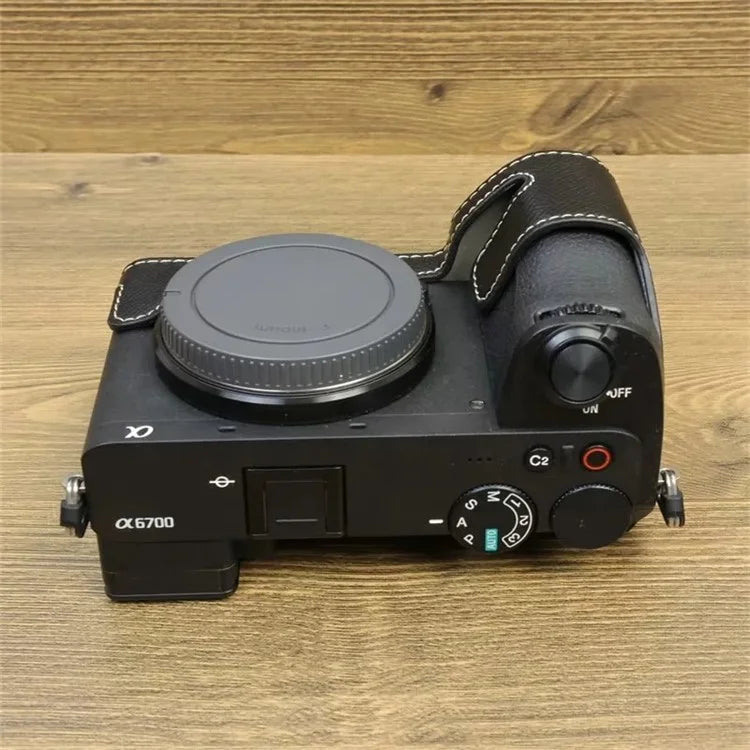 For Sony A6700 Dustproof PU Leather Camera Bottom Cover Half Body Case with Wrist Strap