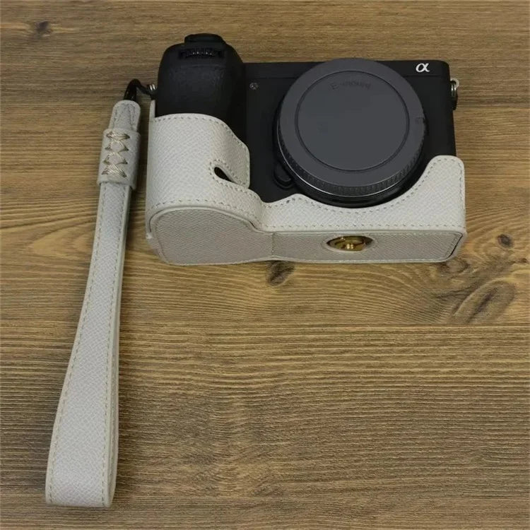 For Sony A6700 Dustproof PU Leather Camera Bottom Cover Half Body Case with Wrist Strap