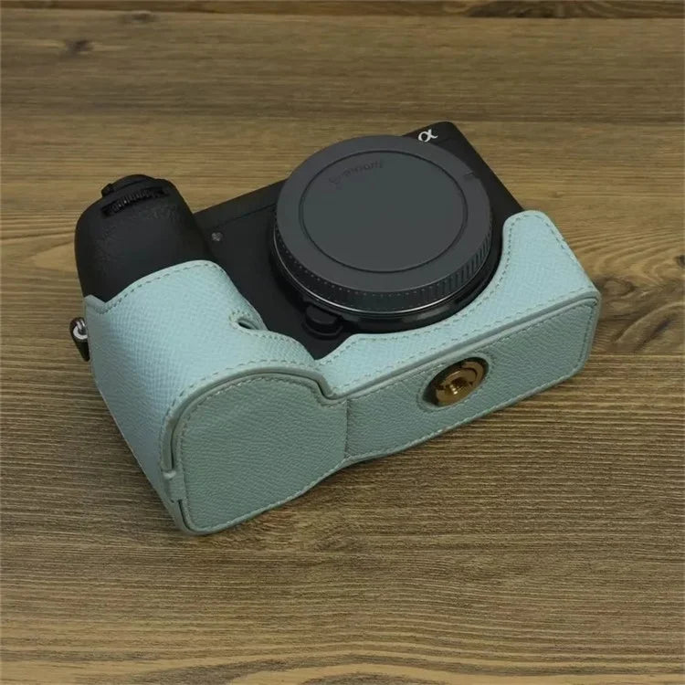 For Sony A6700 Dustproof PU Leather Camera Bottom Cover Half Body Case with Wrist Strap