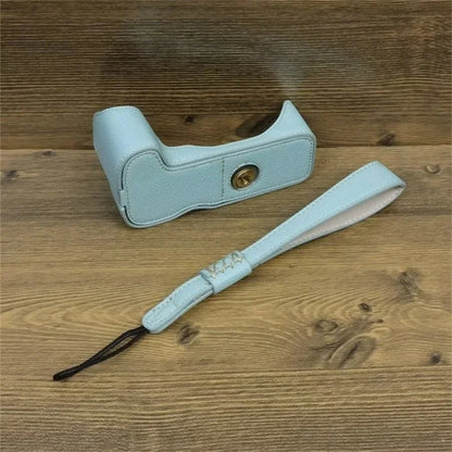 For Canon EOS 200D / 200D II PU Leather Camera Bottom Cover Screw Design Half Body Case with Strap