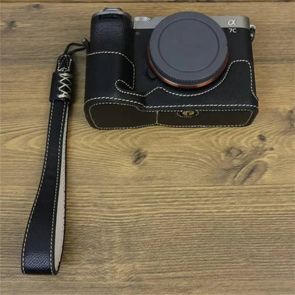 For Sony A7C II Camera Bottom Case PU Leather Anti-drop Half Body Cover with Wrist Strap