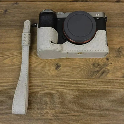 For Sony A7C II Camera Bottom Case PU Leather Anti-drop Half Body Cover with Wrist Strap