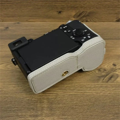 For Sony A7C II Camera Bottom Case PU Leather Anti-drop Half Body Cover with Wrist Strap