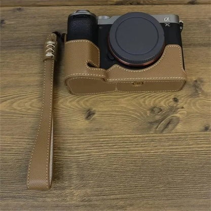 For Sony A7C II Camera Bottom Case PU Leather Anti-drop Half Body Cover with Wrist Strap
