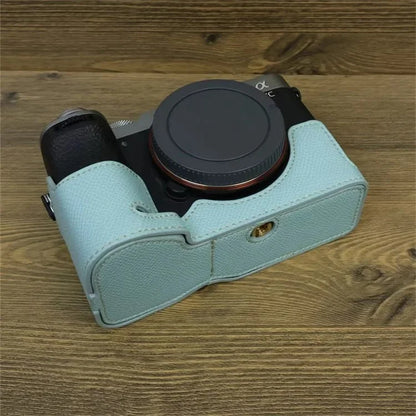For Sony A7C II Camera Bottom Case PU Leather Anti-drop Half Body Cover with Wrist Strap