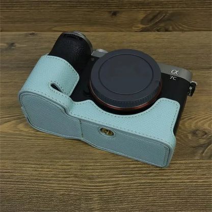 For Sony A7C II Camera Bottom Case PU Leather Anti-drop Half Body Cover with Wrist Strap