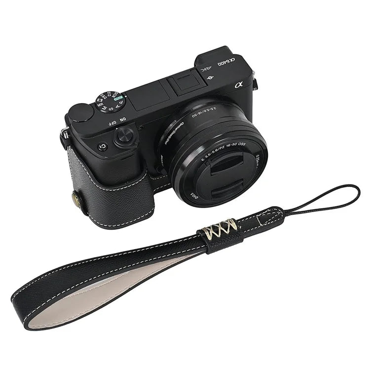 Camera Case for Sony A6400 / A6300 / A6100 / A6000 Battery Opening Design Palm Texture PU Leather Half Body Bottom Case with Wrist Strap