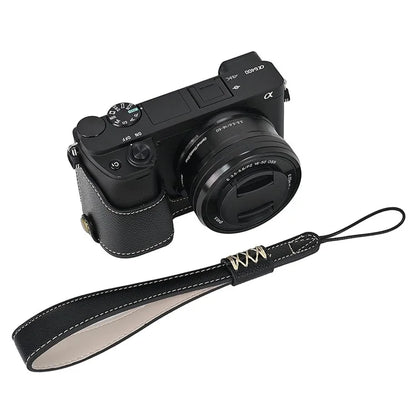 Camera Case for Sony A6400 / A6300 / A6100 / A6000 Battery Opening Design Palm Texture PU Leather Half Body Bottom Case with Wrist Strap
