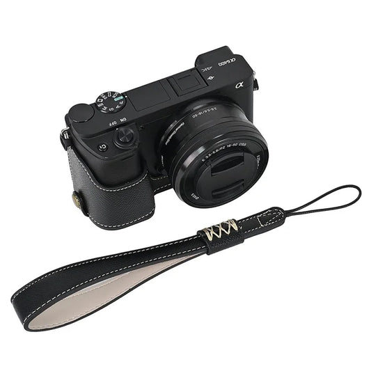 Camera Case for Sony A6400 / A6300 / A6100 / A6000 Battery Opening Design Palm Texture PU Leather Half Body Bottom Case with Wrist Strap