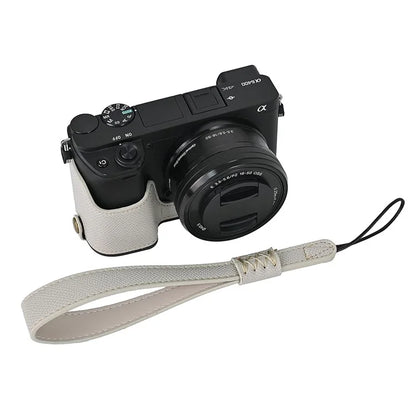 Camera Case for Sony A6400 / A6300 / A6100 / A6000 Battery Opening Design Palm Texture PU Leather Half Body Bottom Case with Wrist Strap