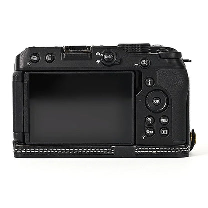 For Nikon Z30 / Z50 Battery Opening Design PU Leather Camera Cover Palm Texture Half Body Bottom Case with Wrist Strap